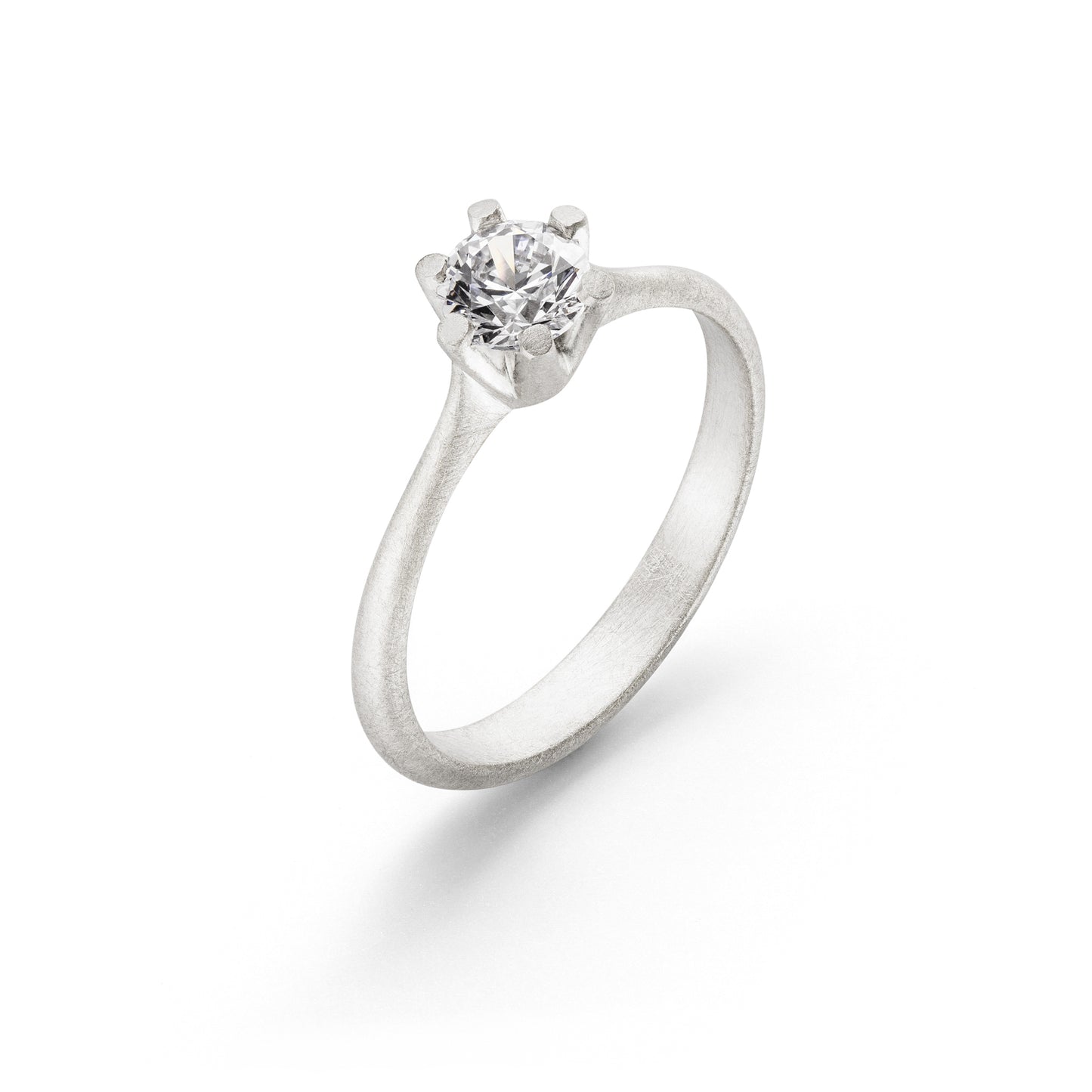 Verlobungsring der Chaton-Kollektion in 18 kt weissgold mit Diamant von Jan Spille Hamburg